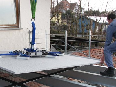Referenzen - Balkonsanierung - Verlegung mit Vakuumsauger auf Stahlunterkonstruktion